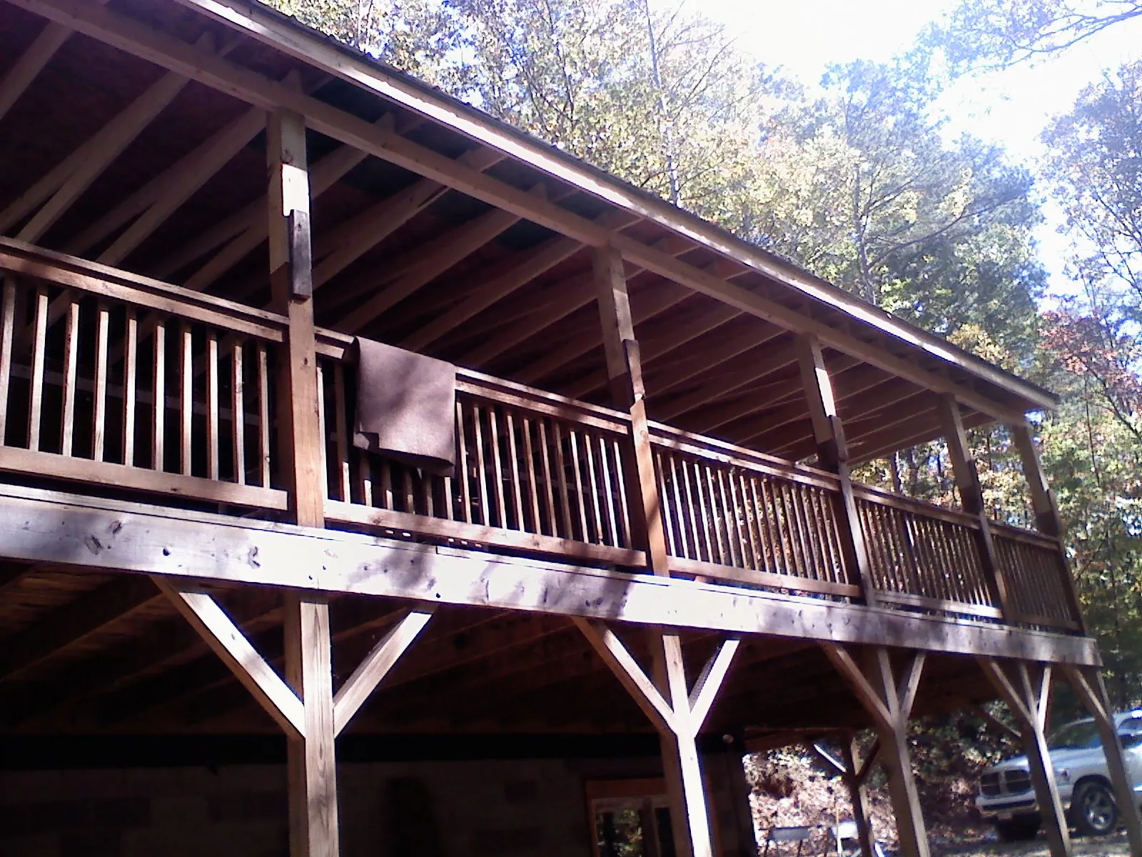 Timber framing under a new elevated porch and deck — Roof Leak Repair in Mancelona by Roofing Brothers